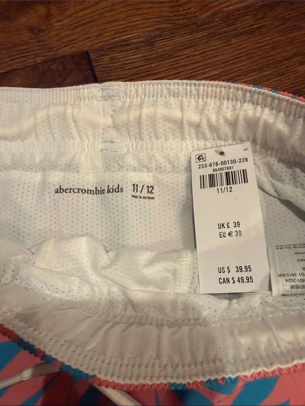 Boys Abercrombie Kids Swim Trunks Tropical Print Swim Shorts in Coral & Blue